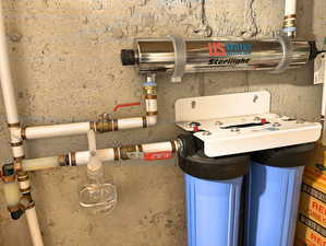 whole-house water filtration with dual carbon filters and UV light