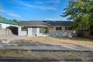 Ranch-style house with a carport