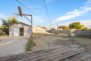 Exterior space featuring a shed