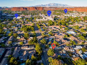 Birds eye view of property featuring a mountain view