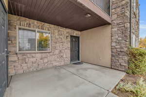 Entrance to property with a patio area