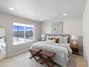 Bedroom featuring carpet flooring and a textured ceiling