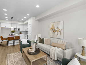 Living room with light wood-type flooring