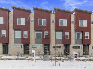 View of snow covered property