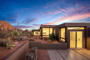 Exterior space featuring a balcony and a mountain view