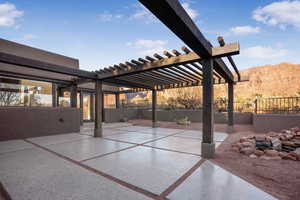 View of patio featuring a pergola and a mountain view