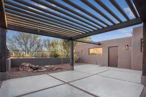 View of patio featuring a pergola