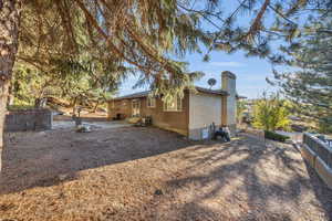 View of property exterior with a patio area