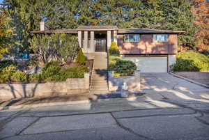 View of front of home featuring a garage