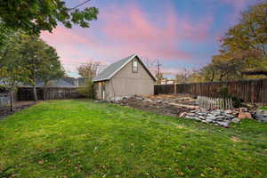 View of yard at dusk