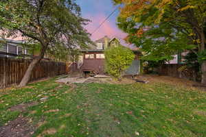 View of yard at dusk