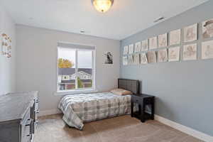 View of carpeted bedroom