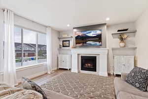 Living room with hardwood / wood-style floors