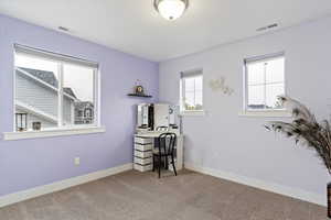 Bedroom featuring carpet floors