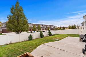 View of yard with a patio area