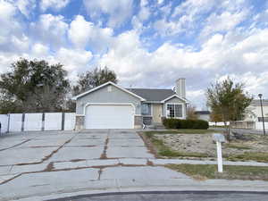 Single story home featuring a garage