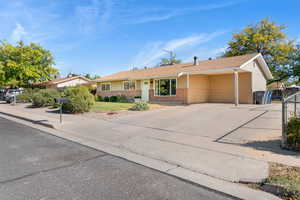 Ranch-style home featuring a garage