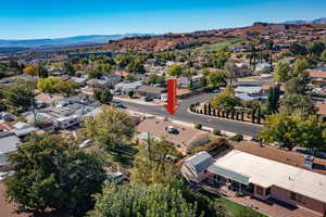 Birds eye view of property with a mountain view