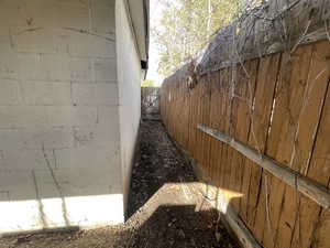 view of garden patch on side of garage