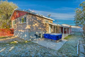 Rear view of property featuring a patio