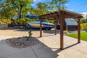 View of patio / terrace with a carport