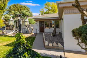 Entrance to property with a yard