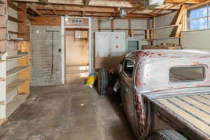 Garage featuring a garage door opener