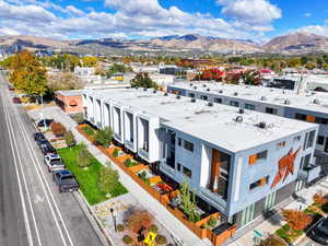 Birds eye view of property with a mountain view