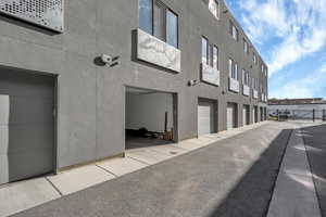 View of property with a garage