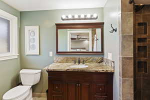 Master Bathroom with tiled walk in shower and lots of niche storage.