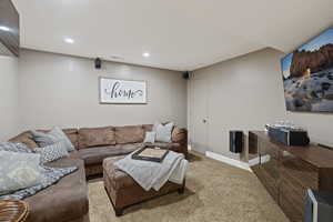 Theatre/Den makes for a cozy space to relax and put your feet up for a good movie or football game!