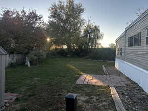 View of yard at dusk