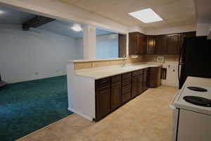 Kitchen Open to Dining Area and Family room Featuring Wood Burning Stove