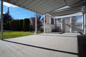 Covered Trex Deck Off Family Room to Backyard