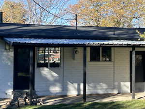 Large covered patio in backyard