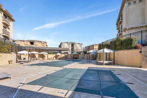 View of swimming pool with a patio area