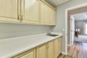 Lots of Cabinets, laundry sink and counter space in Laundry Room