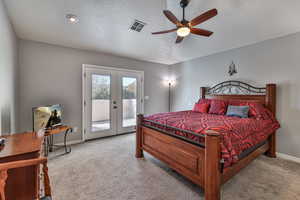 Main Bedroom with French Doors to back Private Patio