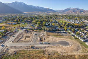 Birds eye view of property with a mountain view