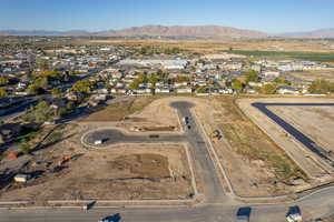 Birds eye view of property with a mountain view