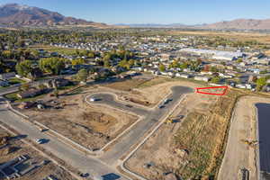 Birds eye view of property featuring a mountain view