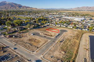 Birds eye view of property with a mountain view