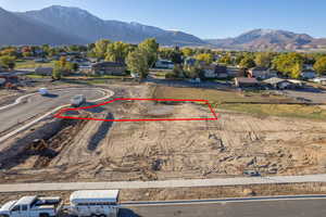 Birds eye view of property with a mountain view