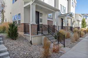 Property entrance with a porch