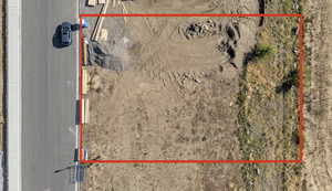 Aerial overview of property's location with property parcel outlined