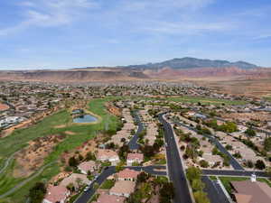 Birds eye view of property featuring a mountain view