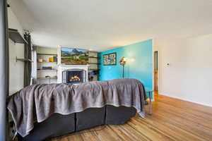 Living room with light hardwood / wood-style floors