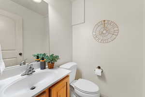 Bathroom with toilet and vanity