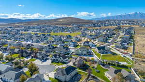 Birds eye view of property with a mountain view