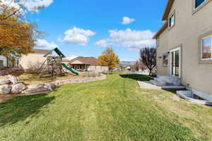 View of yard with a playground